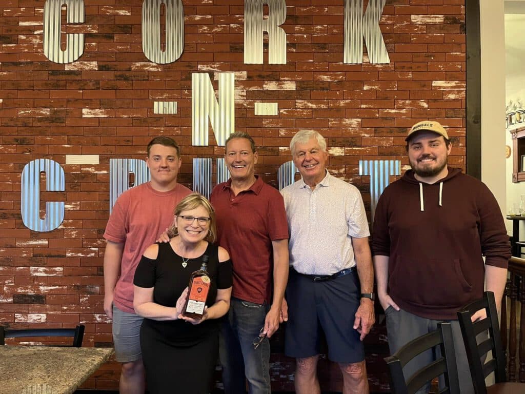 Cork N Crust Founders Deb & Billy with sons and Ken Anderson